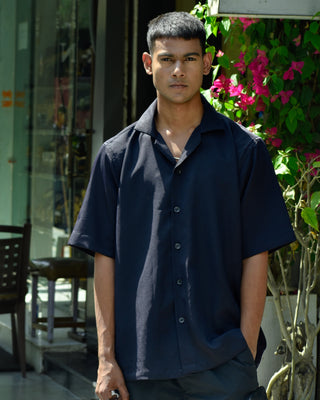 Standing Men Wearing Streetwear 'Editable Navy Blue Oversized Shirt', resting one hands in pant pockets - Front
