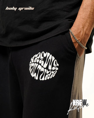 Men in Streetwear Style 'The MoonForm' Black 240 GSM French Terry Lycra Screen Printed Lower HG x Krewe Kulturr - Front Logo Close Up