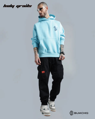 Guy Standing in Streetwear 'Birds Of Feather' Light Blue 350-370 GSM 100% Cotton Puff Print Oversize Hoodie HG x Bumchiq - Front Full