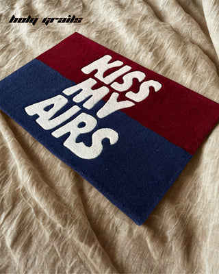 'The KMA' Hand Tufted Rug on Blanket