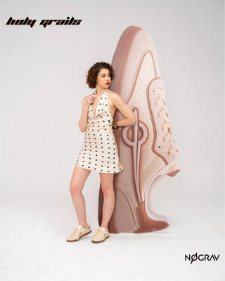 Women Standing beside Sneaker Cutout wearing Homegrown 'Cheesecake' Cream Premium PU Upper, Cushioned Footbed, Eva Midsole & Rubber Outsole Lightweight Sneaker HG x NoGrav - Front & Side